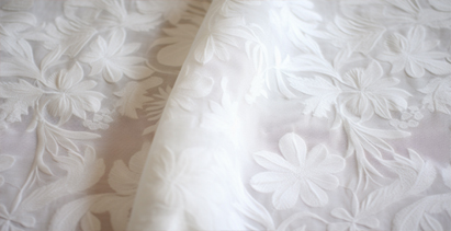 white embroidered linen fabric